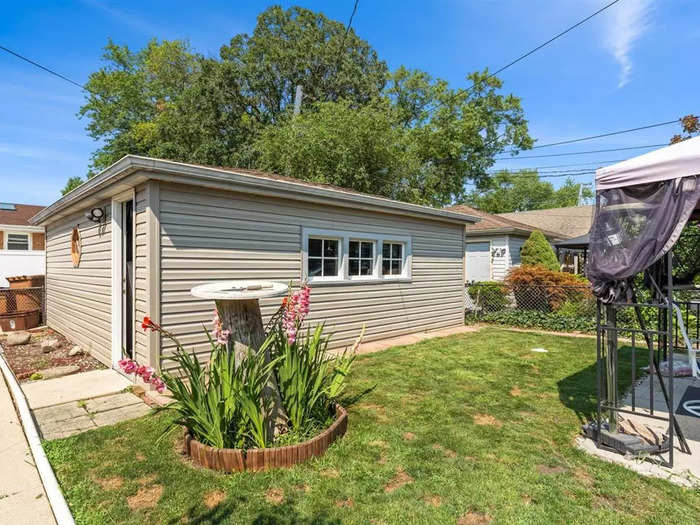 The home also has a decent-sized backyard with a garage.