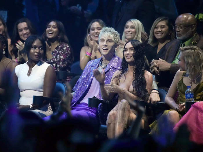 Machine Gun Kelly and Megan Fox were moved to the front row just before he won the award for best alternative.