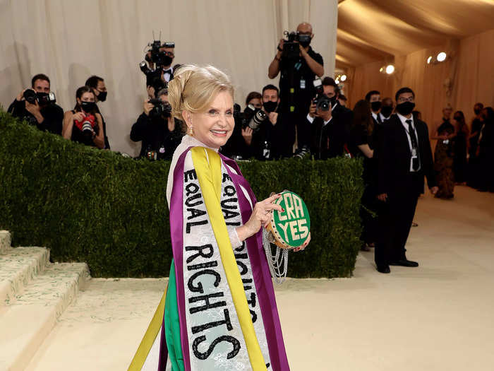 Congresswoman Carolyn B. Maloney wore a dress made of "equal rights for women" pennants.