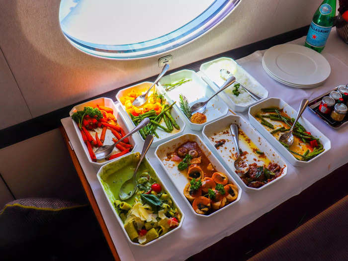 The credenza acted as the buffet table for this flight, allowing passengers to take what they pleased throughout the flight.