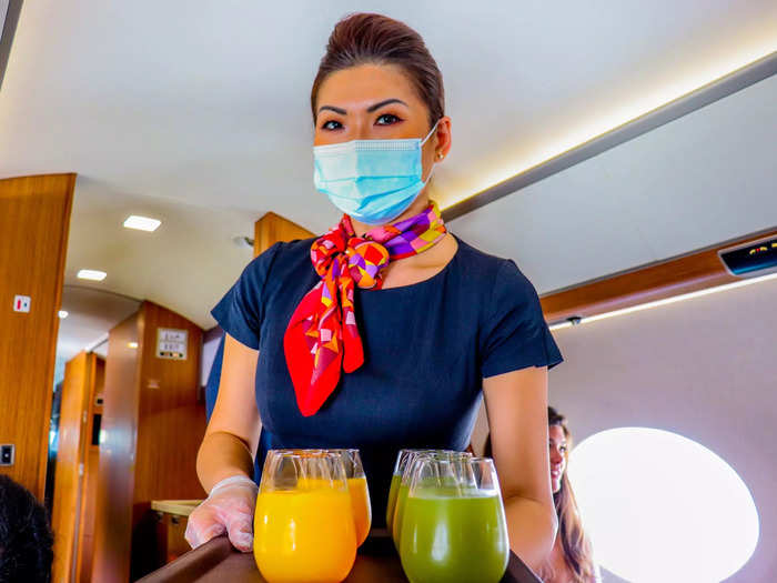 Next came the pre-departure beverage. A full bar including soft drinks, juices, and alcohol is stocked and complimentary on Qatar Executive flights, just as on Qatar Airways.