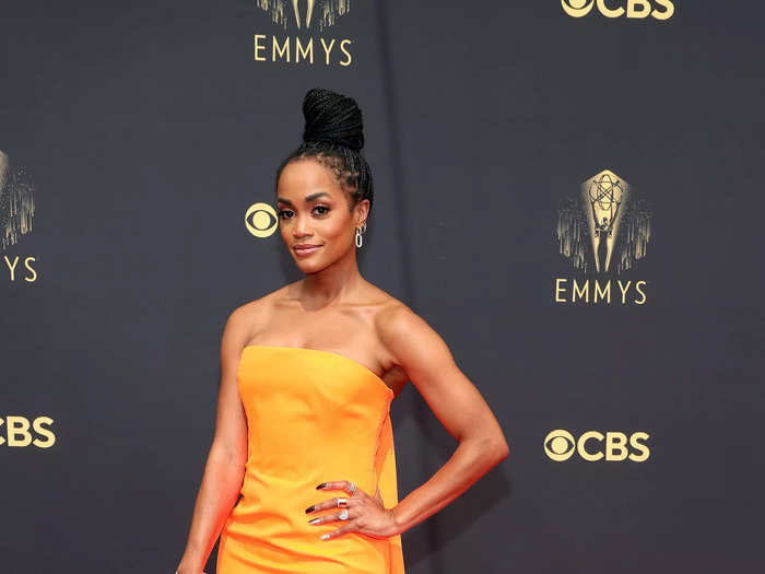 Rachel Lindsay looked like a ray of sunshine in this orange dress with a long train.