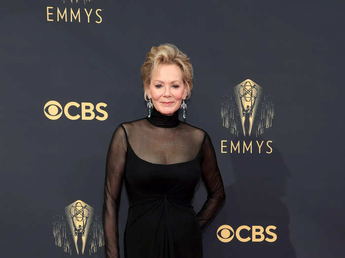 Jean Smart went for a chic black dress with sheer sleeves.