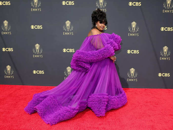 Nicole Byers brought the drama in this sheer purple dress.