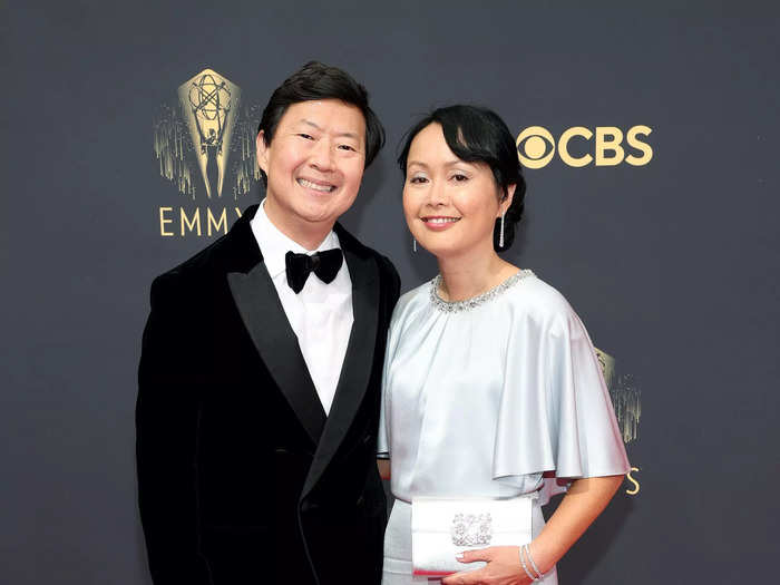 Ken Jeong skipped the classic suit jacket with this velvet one, while his wife wore a silver dress.