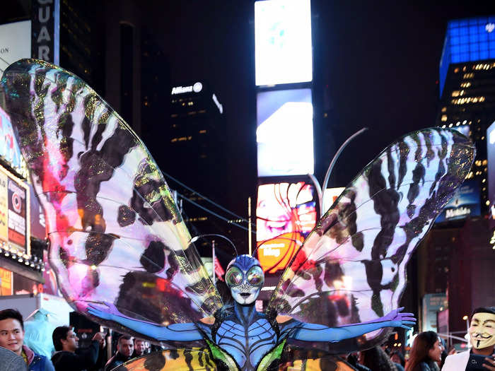 Her 2014 costume was a giant patterned butterfly with an anatomically correct mask.