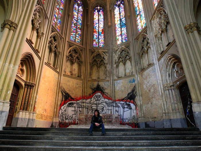 An abandoned convent known as Gesu in Brussels, Belgium, serves as a makeshift home for immigrants from the Czech Republic, Spain, Brazil, and Morocco.