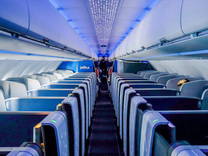 Business class seats are arranged in a 1-1 configuration across 12 rows, taking up nearly half of the aircraft.