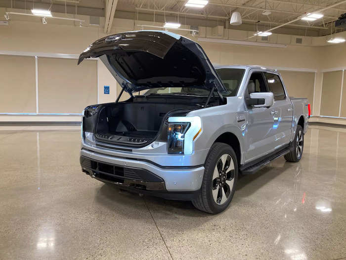 Under the hood, the F-150 Lightning has a roomy front trunk dubbed the Mega Power Frunk.