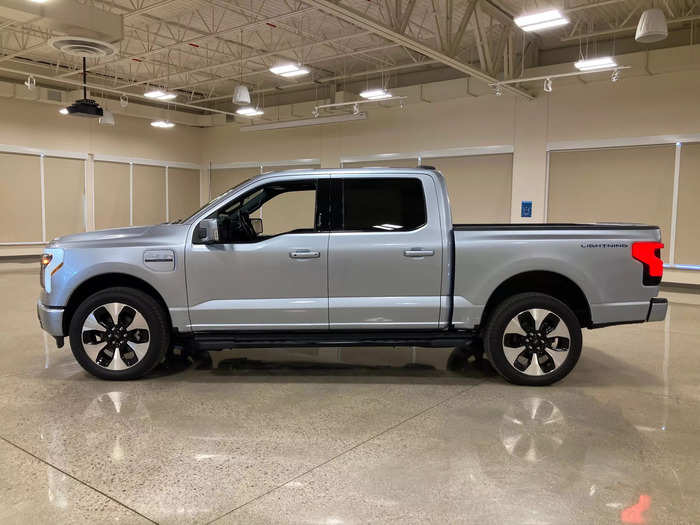 Ford redesigned the front fenders, hood, bed sides, and running boards for aerodynamics and to fit the new lights and charging door.