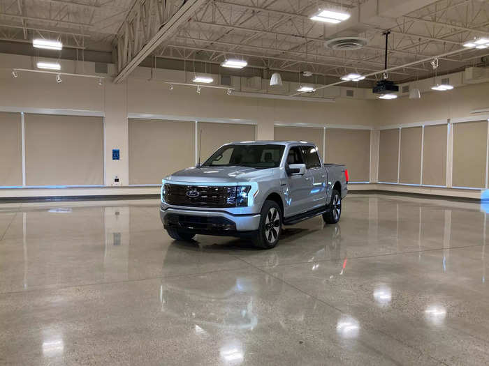 Across a crowded parking lot, you might mistake the upcoming F-150 Lightning for just another gas-drinking Ford truck.