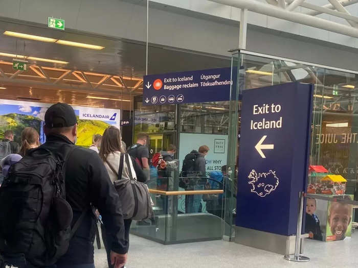 After passing customs, I made my way through the arrivals hall before coming to a large "Exit to Iceland" sign and a roped-off section for travelers entering the country.