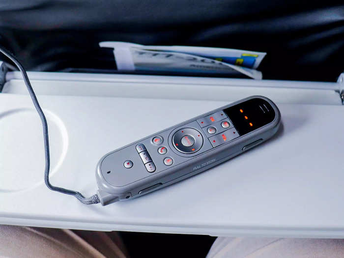 A tethered remote is also available to control the system and act as a game controller or keyboard for the seat-to-seat chat function. It also comes in handy when scrolling through content since the touch functionality is quite poor in that regard.