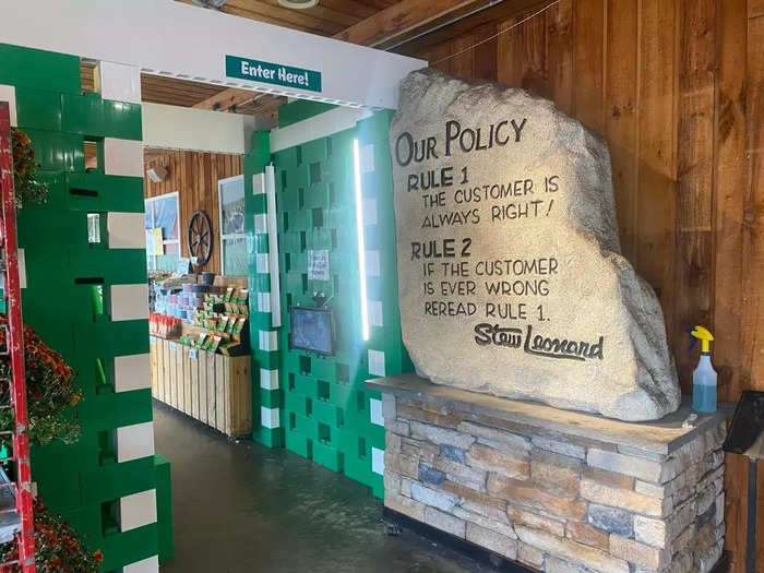 When I entered the building lobby, I saw a garden of flowers, plants, and pumpkins - right in time for the fall season. Also in the space was a photo booth and a rock that outlined the company