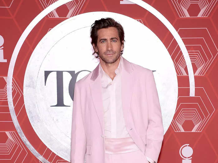 Jake Gyllenhaal stood out in a pink Prada suit with a satin cummerbund.