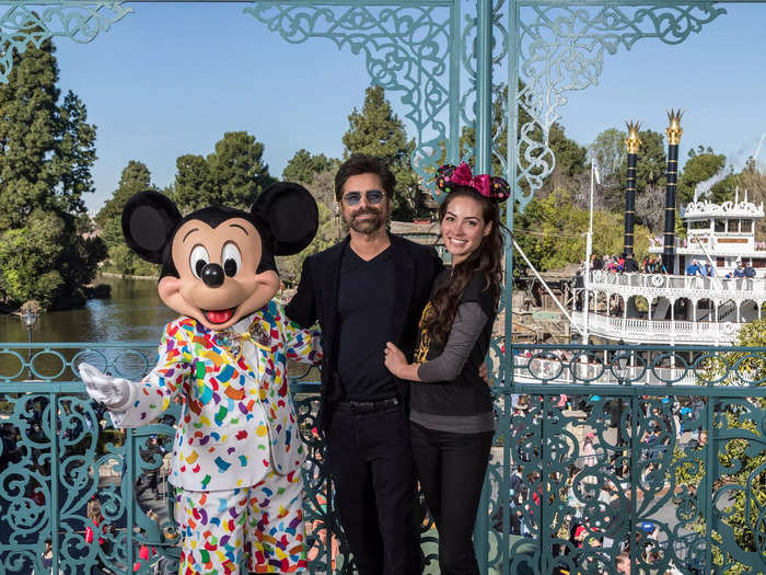 John Stamos proposed to Caitlin McHugh Stamos at Disneyland in October 2017.