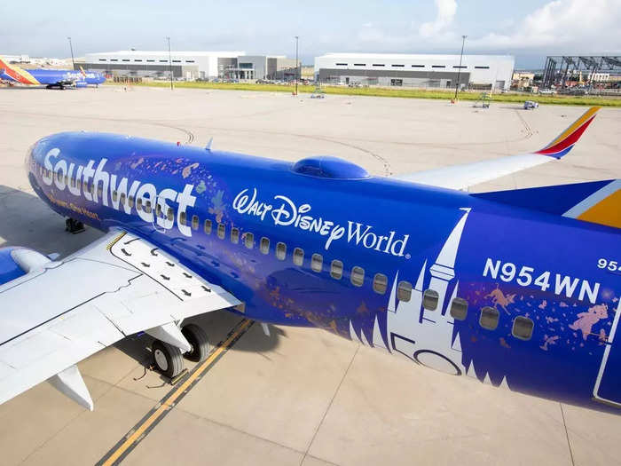 The Boeing 737-700 aircraft features the 50th-anniversary logos for both Southwest and Disney and has been emblazoned with a specially-made "EARidescent treatment," giving the plane a brilliant sheen.