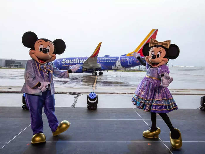 Southwest Airlines and Walt Disney World Resort unveiled a special co-branded aircraft livery on Tuesday to celebrate the 50th anniversaries of both companies.