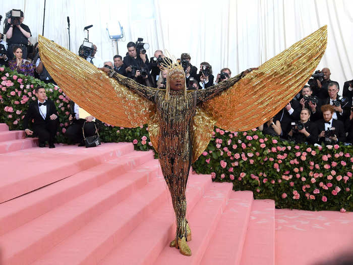 Porter showed up to the Met Gala in 2019 with a pair of gold wings.