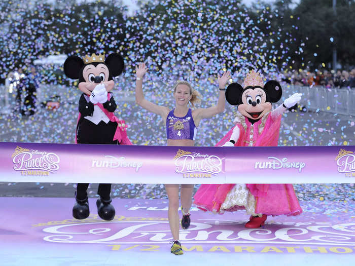 When you run the Princess Half Marathon in Disney World, you get cheered on by Mickey and Minnie, as seen here in 2012.