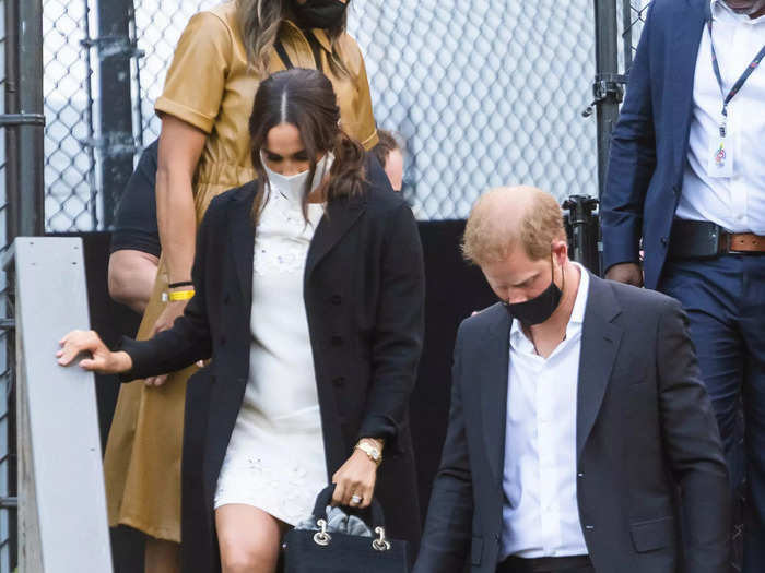 To depart the venue, the duchess added a simple black coat and carried a Lady Dior handbag.