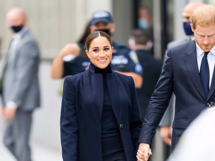 After touching down in the Big Apple, Meghan Markle wore a stylish, fall-appropriate look to visit the 9/11 Memorial with Prince Harry.