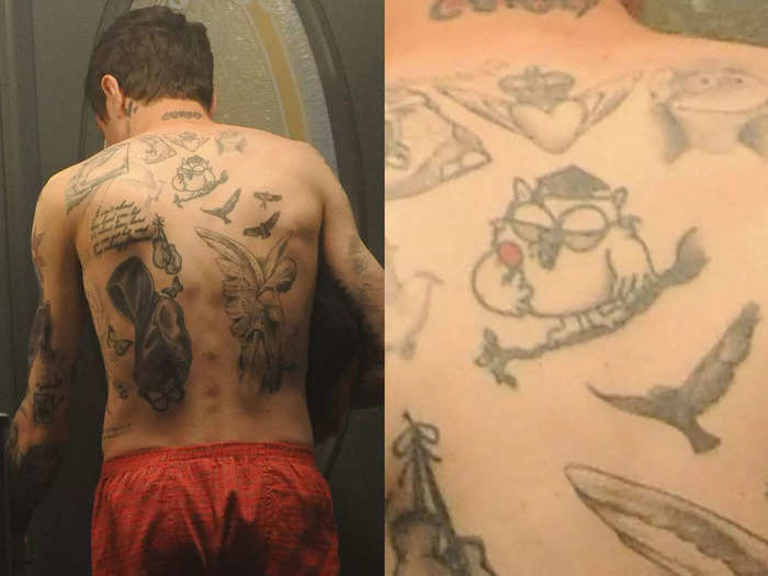 He has the Tootsie pop owl tattooed on the middle of his back.