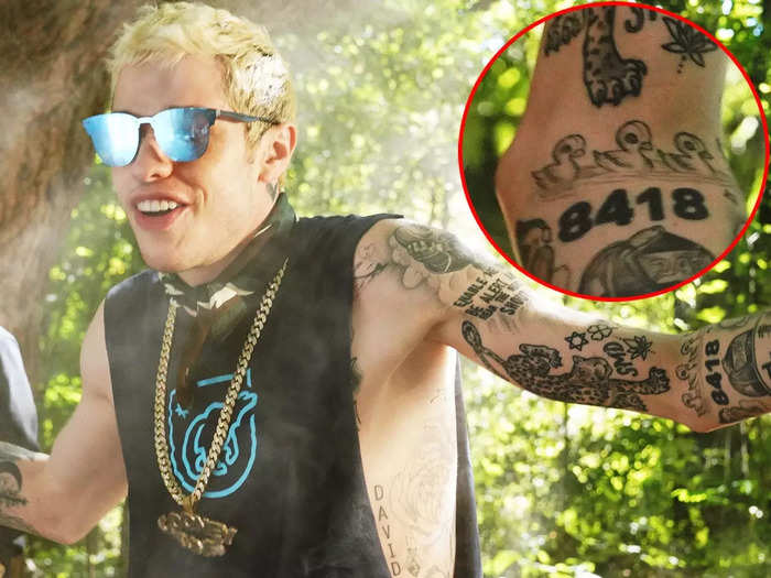 He has three rubber ducks above the "8418" tattoo.