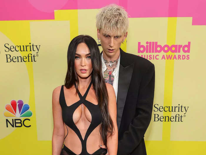 Megan Fox donned a black Mugler dress with daring cutouts on the bodice and a sheer skirt to the 2021 Billboard Music Awards.