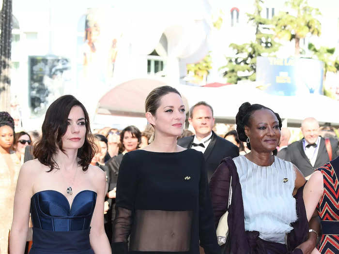 Marion Cotillard sported a black Guy La Roche gown with panels of sheer fabric on the bodice and skirt at the 2018 Cannes Film Festival.