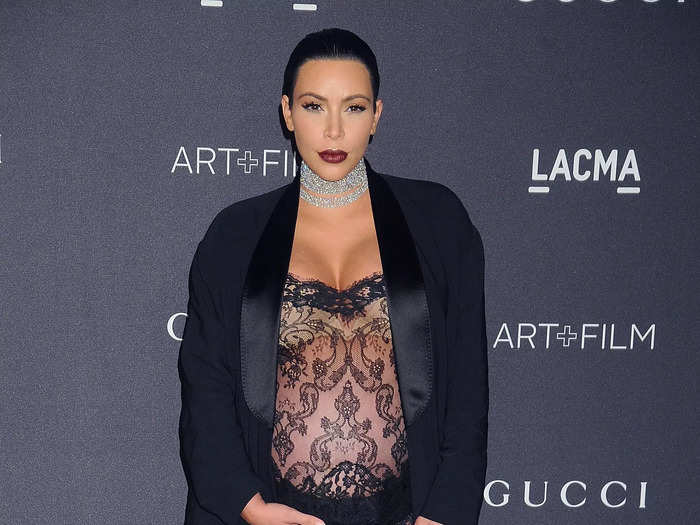 Later that year, the reality star wore a Givenchy lace jumpsuit that exposed her baby bump and had a lingerie-like effect to the LACMA Film + Art Gala.