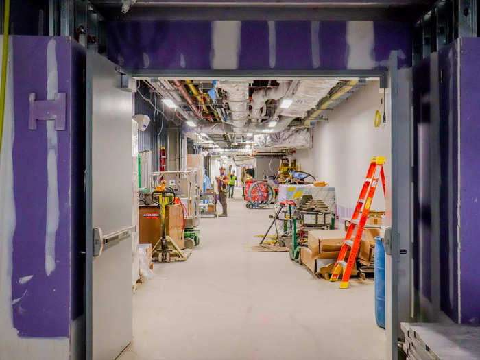 Underneath the security checkpoint level is a long service corridor that runs the length of the terminal. Passengers will never see it.