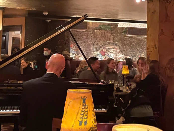 As we nibbled on the delicious food, a man got behind the piano around 5:30 p.m.