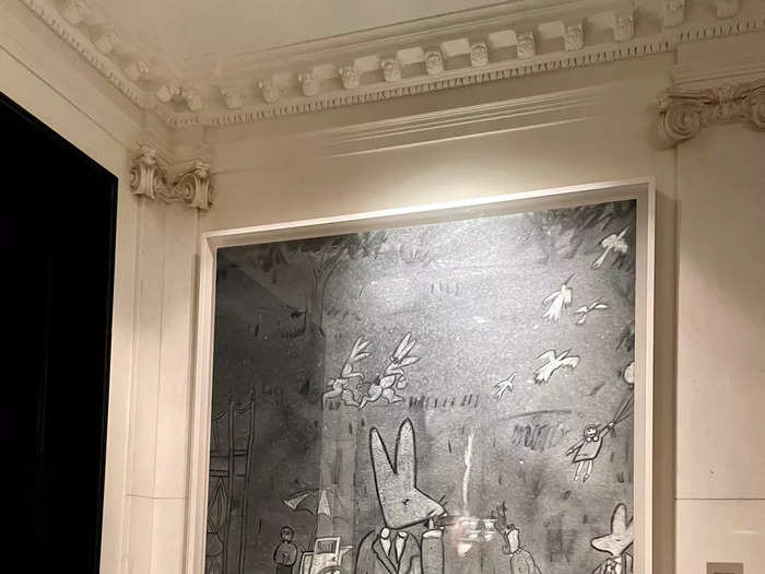 As we headed to the bar, I noticed a huge picture of a bunny wearing a suit and smoking a cigar.