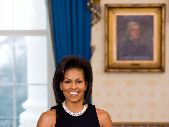 Some also took issue with her choice of a sleeveless black dress for her official White House portrait.