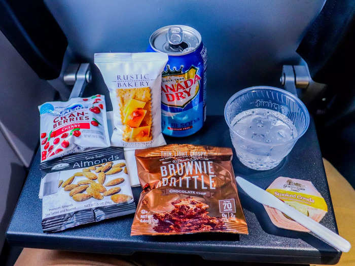 I purchased the $11 snack box and drink combo that came with almonds, Brownie Brittle, Craisins, crackers, and smoked gouda cheese. It was a typical airline snack box and I enjoyed every bite. The total cost of my $34.57 Spirit ticket was now $35.57.