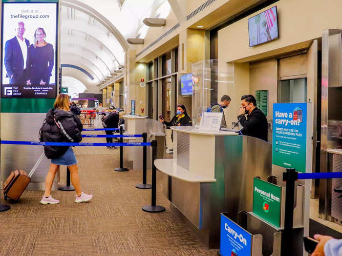 Boarding began in groups around 30 minutes prior to departure. Travelers that purchase extras like a carry-on bag or early boarded, as well as Spirit credit cardholders, are given the first two zones and board first.