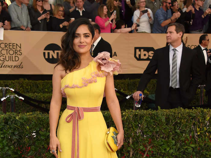 Hayek brightened up the red carpet of the 2017 SAG Awards in a yellow one-shouldered Gucci gown.