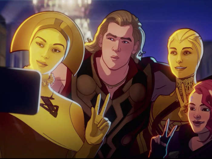 Thor takes a selfie with two members of the Sovereign, who appeared in 