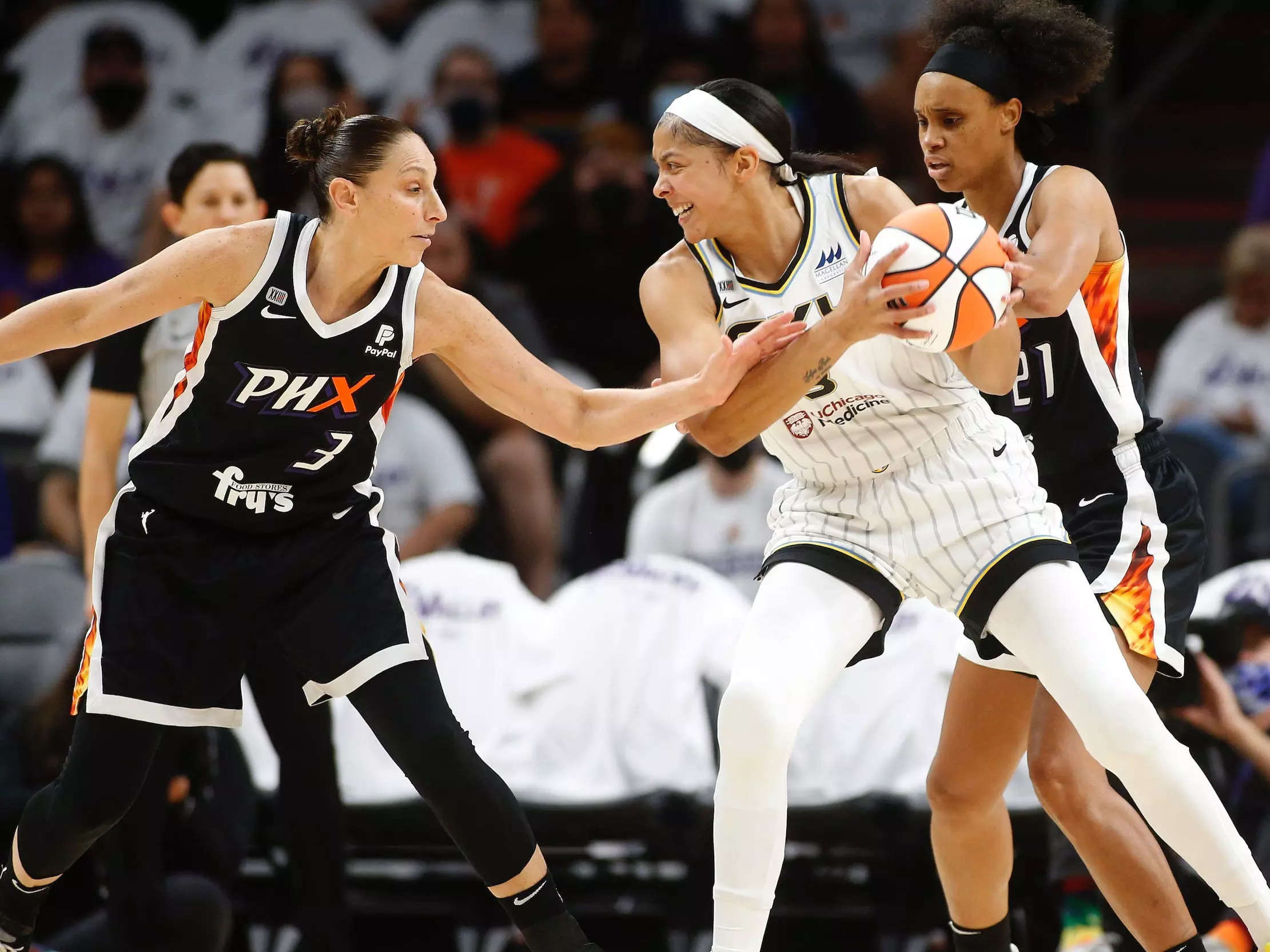 Diana Taurasi (left) defends Candace Parker of the Chicago Sky.