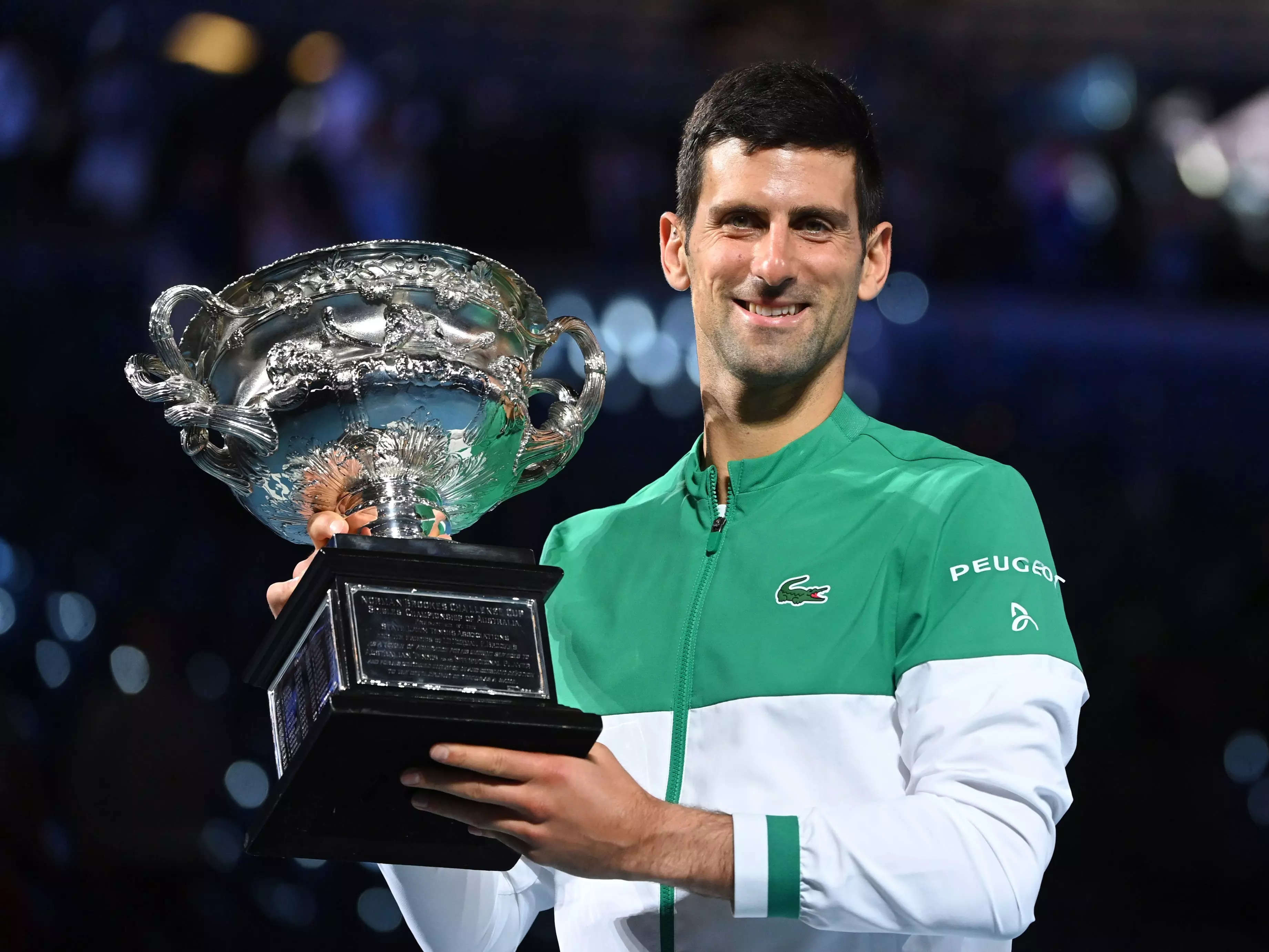 Novak Djokovic with the Australian Open trophy.