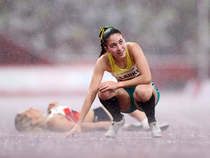 9/4: Australian Rhiannon Clarke reacts after competing in the 400m in the rain at the Tokyo Paralympics.