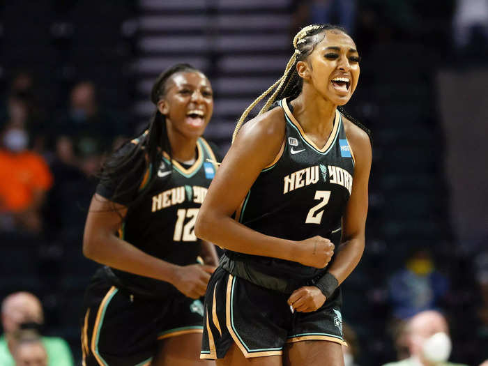 9/2: New York Liberty rookies DiDi Richards and Michaela Onyenwere react after scoring against the Seattle Storm.