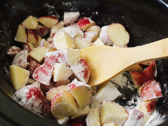 I then sprinkled the potatoes with flour and gave the pot a stir.