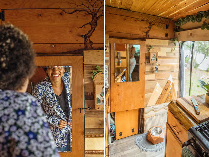 Above that wall, which separates the cab from the house, Nat said Abi wood-burned a tree, adding that their mirror is on the door to the cab just below it.