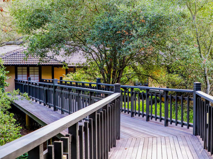 At a bend in the footbridge leading to the resort, guests are instructed to take three deep breaths and leave the stresses of the outside world behind.