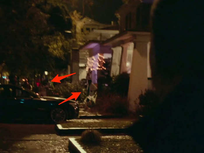 Right before entering a house to murder a babysitter (and spare the child - a nod to the 1978 film), Michael runs into a couple dressed as healthcare workers.