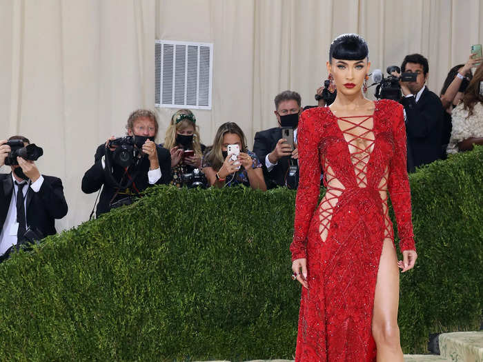 In 2021, Fox made her Met Gala debut in a striking red dress with crisscross cutouts and a thigh-high slit.