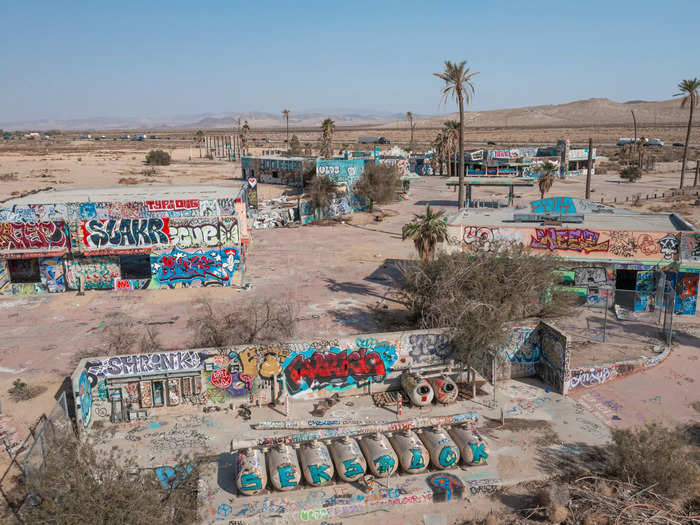 One of the most distinctive aspects of the abandoned space is the amount of graffiti and spray paint covering the remaining structures.