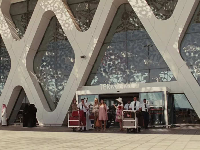 In "Sex and the City 2," the girls are seen arriving at Marrakech Airport in Morocco, not Abu Dhabi International Airport. In fact, all of the Abu Dhabi scenes were shot in Morocco.